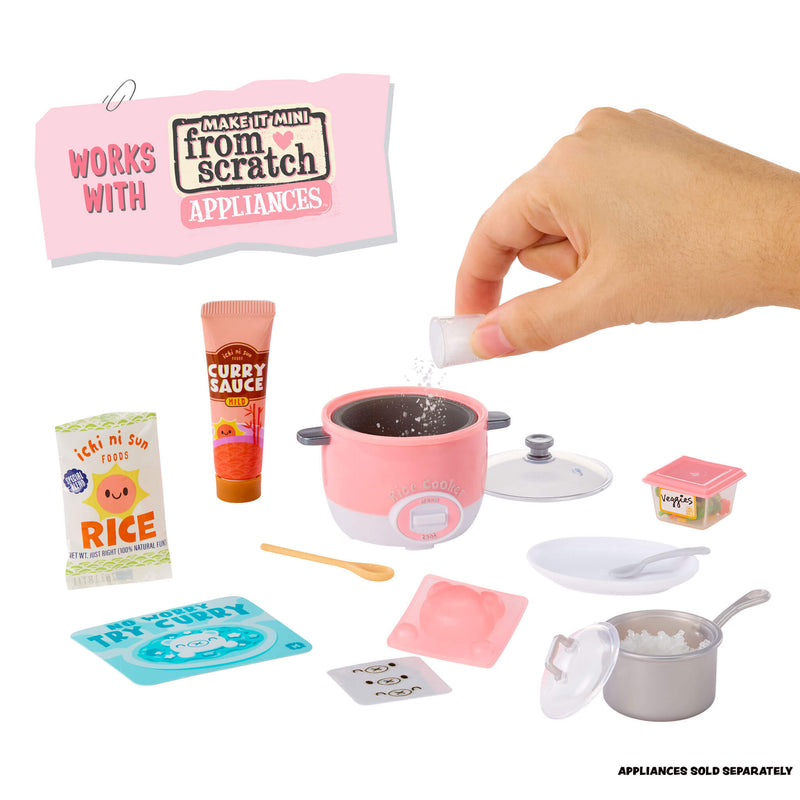 Miniature kitchen set with pink rice cooker, ingredients, and a hand adding salt.