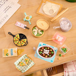 Mini food and cooking utensils set on a wood table top