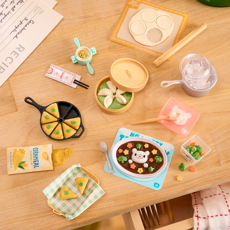 Mini food and cooking utensils set on a wood table top