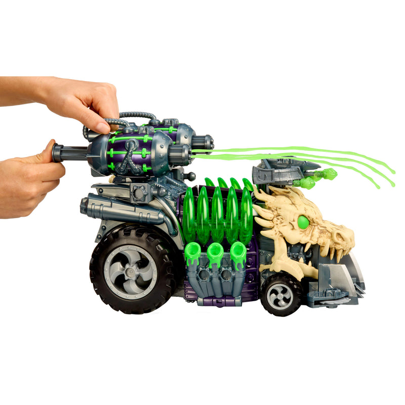 Toy vehicle with dragon design and green slime being sprayed from a pump