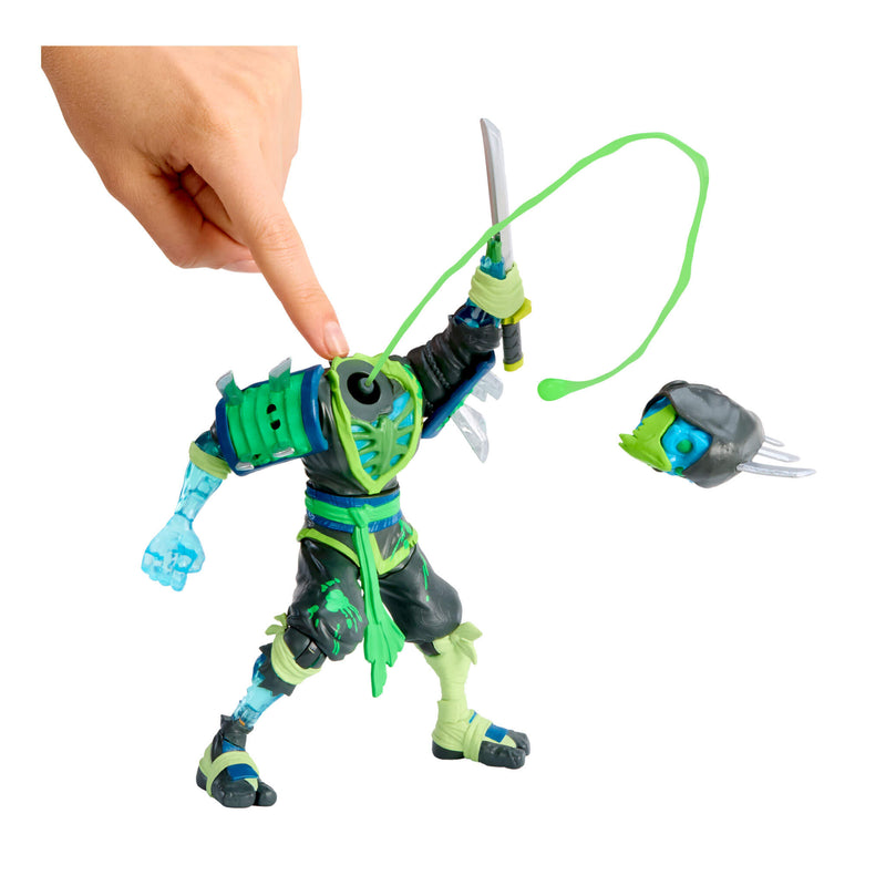 Toy figure with green and black design head comes off and slime squirts