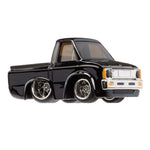 Black vintage toy truck on a white background