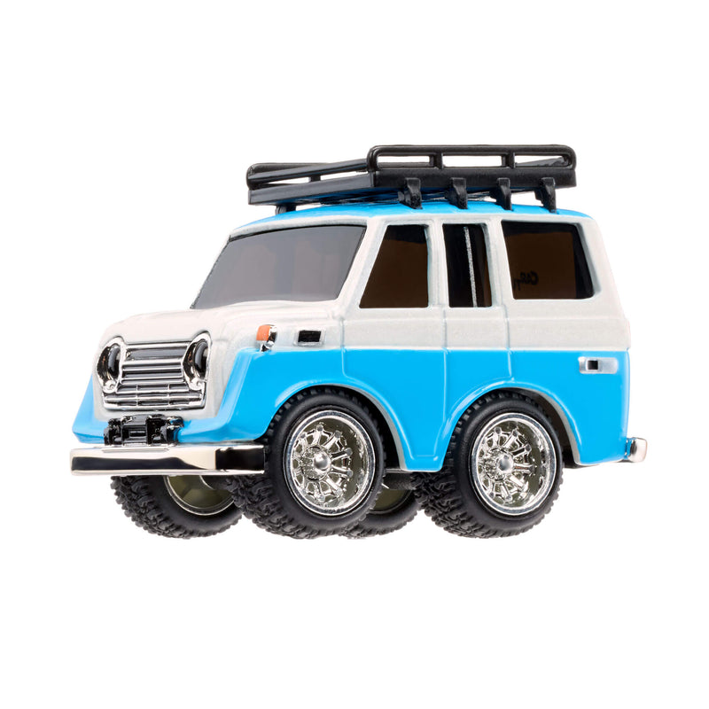 Model of a blue and white SUV with a roof rack on a white background