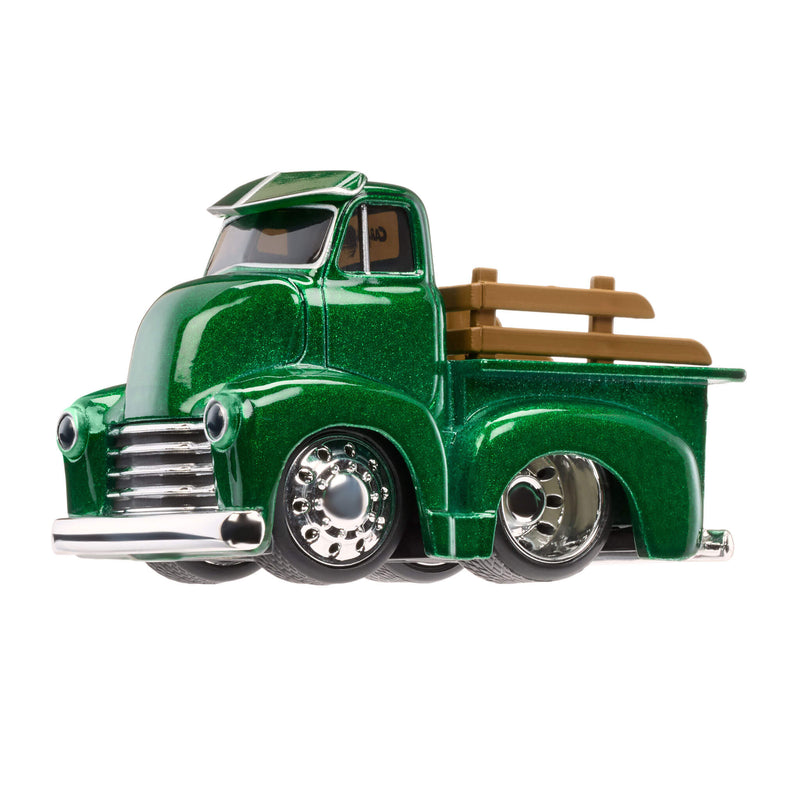 Model of a green vintage truck with a wooden bed on a white background