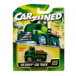 Green toy truck in 'Car Tuned' packaging on a white background
