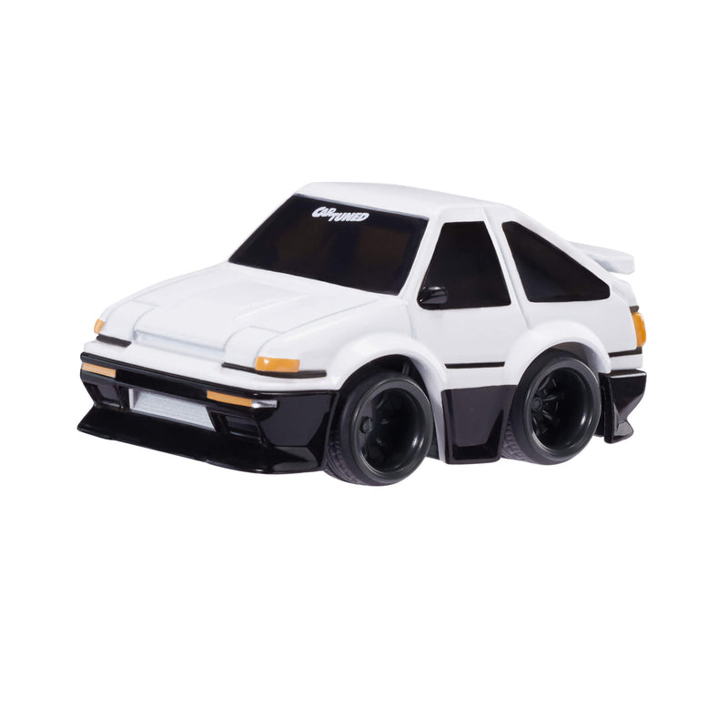 White toy car with black accents on a white background