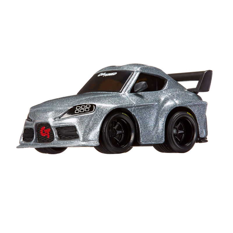 Silver toy car with black wheels on a white background