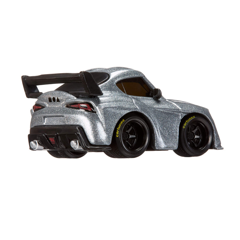 Silver toy car with black wheels on a white background