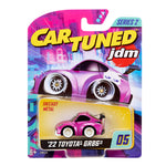 Cart Tuned JDM toy car packaging with a pink car on a colorful background