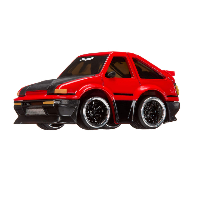 Red and black toy car on a white background