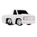 White toy truck with chrome details on a white background