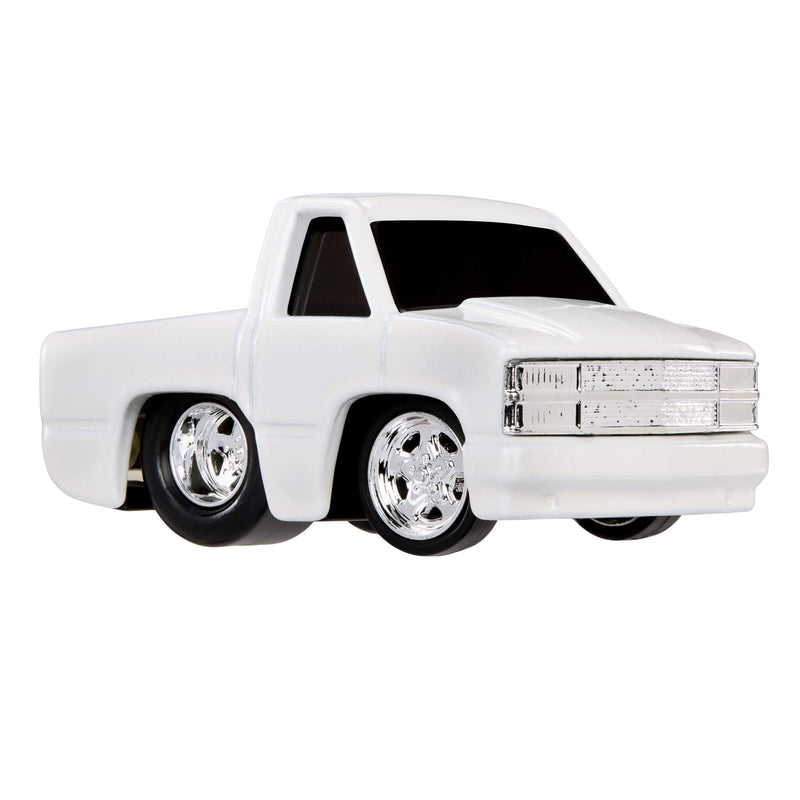 White toy truck with chrome details on a white background
