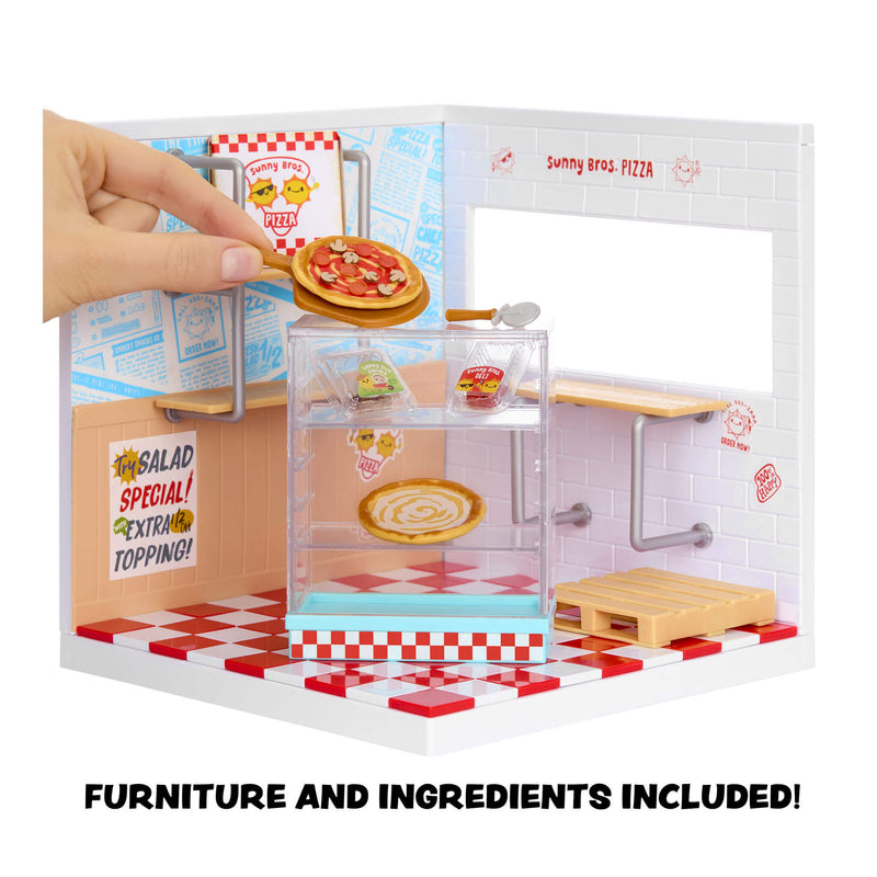 Mini pizza restaurant set with a hand placing a pizza on a tray, featuring Sunny Bros Pizza branding.