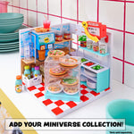 Toy kitchen set with various items on a checkered floor