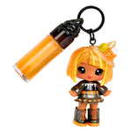 Keychain with a small doll figure and orange bottle on a white background