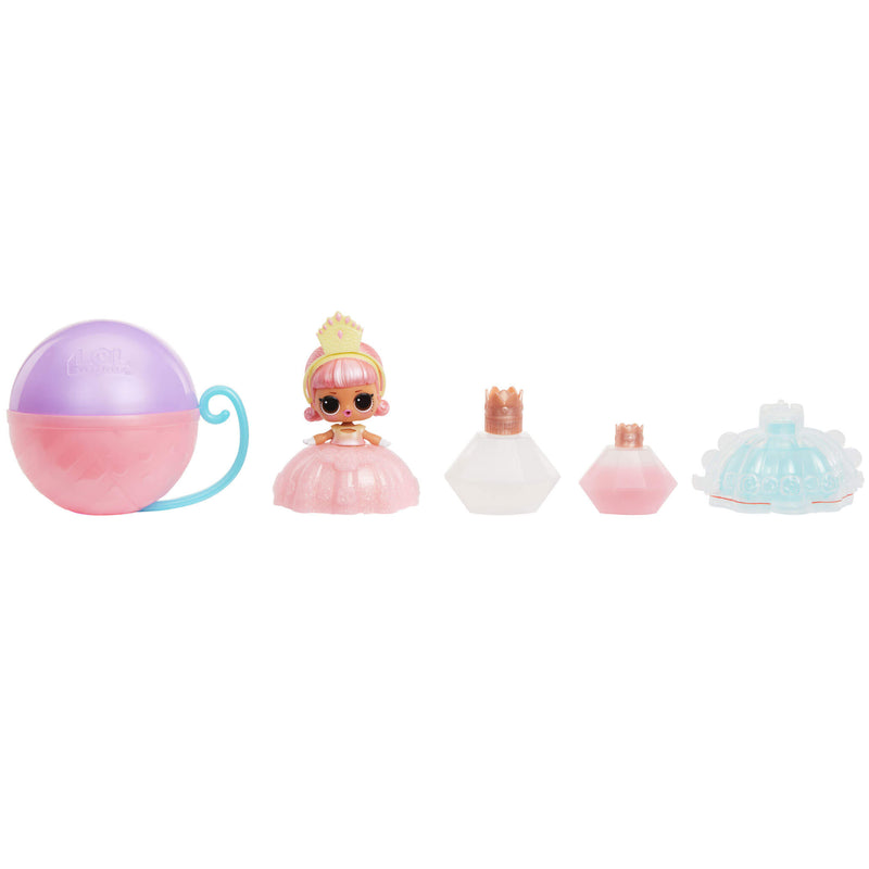 Small doll and three perfume bottles on a white background