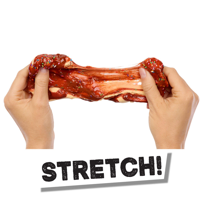 Hands stretching a chewy treat with 'STRETCH!' text below on a white background