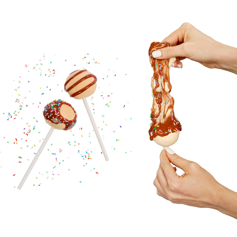 Two slime cake pops with chocolate drizzle and sprinkles on a white background