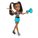Toy doll with brown hair in pigtails, wearing a black and white top and blue skirt, holding a blue megaphone 