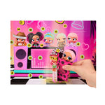 Hand removing a doll in packaging from the calendar on a white background