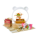 Miniature bird setup with birds, and accessories on a white background