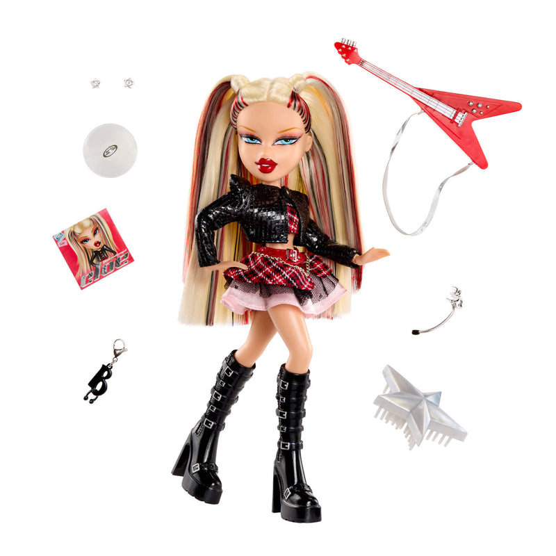 Doll with guitar and accessories on a white background