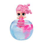 Toy figure with pink hair and dress inside a clear ball with water on a white background