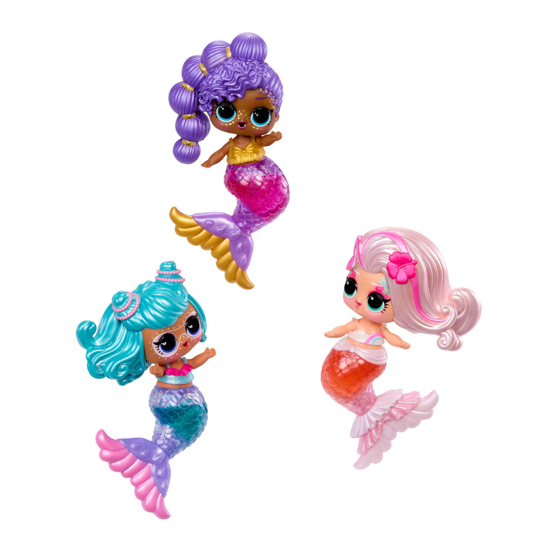 Three colorful mermaid tot dolls with different hairstyles and swimsuits on a white background