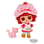 Strawberry Shortcake doll with a cat toy on a white background