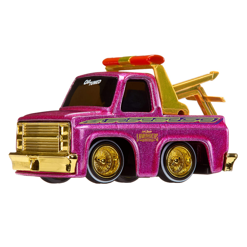Pink toy tow truck with gold accents on a white background