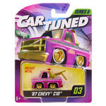 Pink and gold toy truck in packaging with 'Car Tuned' branding