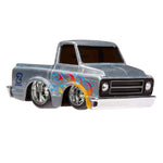 Silver truck with flame design on a white background