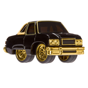 Car with black body and gold accents on a white background