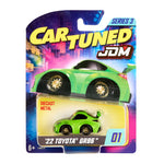 Green Toyota car in 'Cartuned' packaging with colorful background
