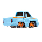 Light blue toy truck with orange accents on a white background