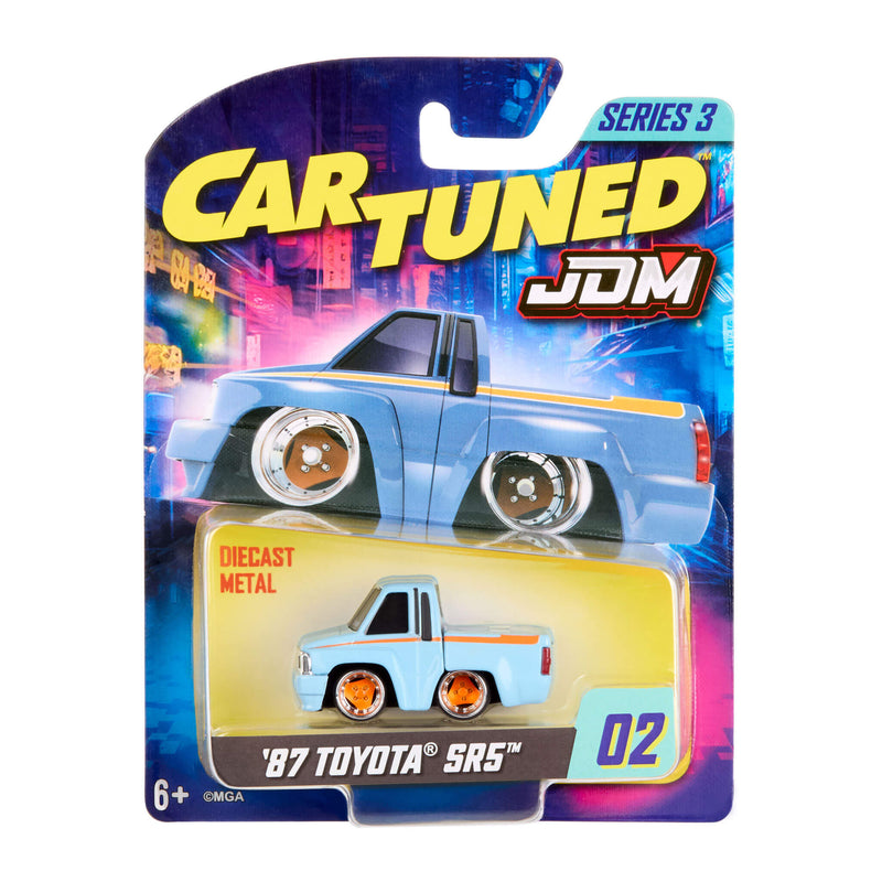 Toy truck in packaging with 'Cartuned JDM' branding on a colorful background