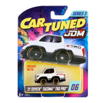 Toy car packaging with 'Car Tuned' and 'JDM' branding on a colorful background