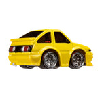 Yellow toy car on a white background