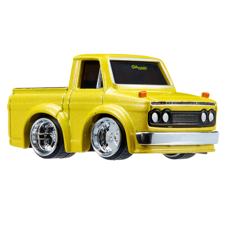 Yellow toy truck with chrome wheels on a white background