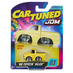 Yellow toy truck in packaging with 'Car Tuned' and 'JDM' branding.