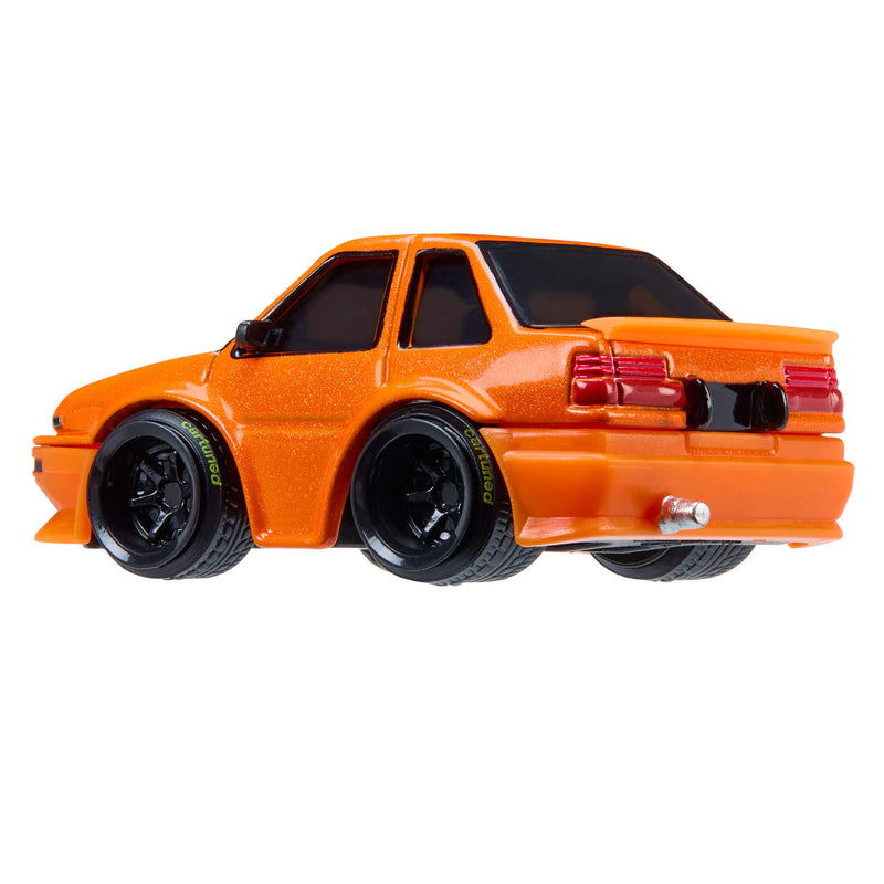 Orange toy car on a white background