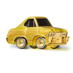 Gold toy car with yellow light underneath on a white background