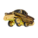 Toy car with front end lifted up on a white background