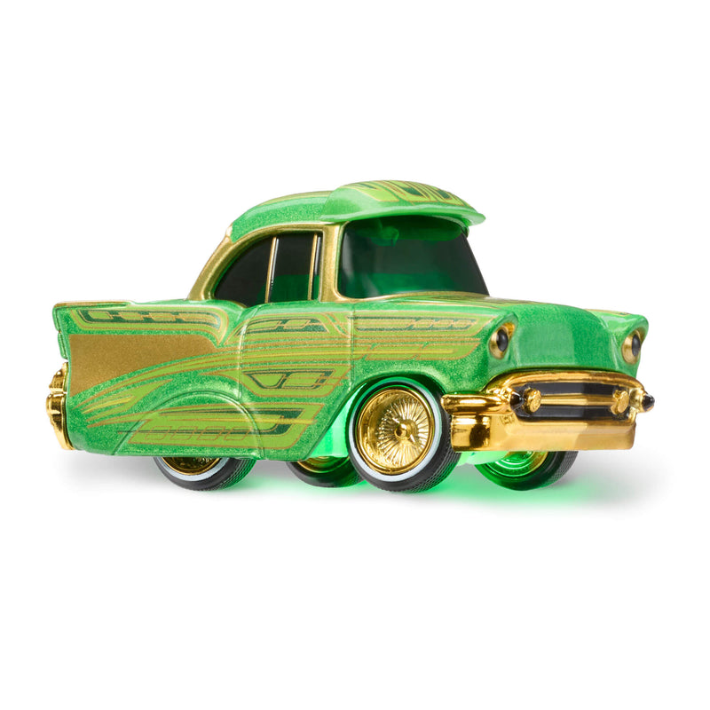 Green and gold toy car with a green "Show Glow" underneath on a white background