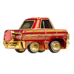 Model truck with red and gold color scheme on a white background