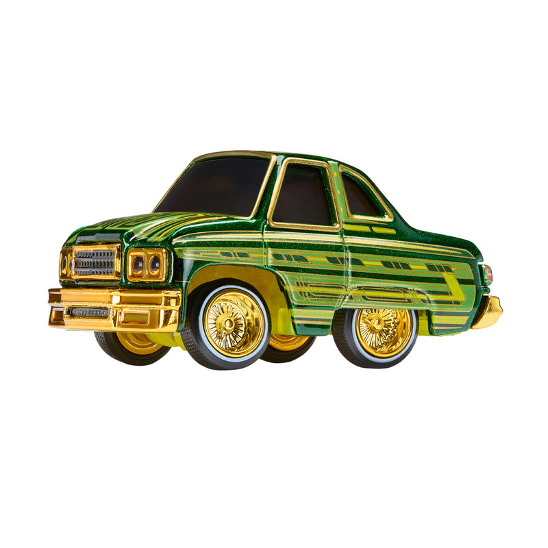 Green and gold car-shaped object on a white background