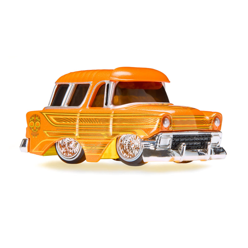 Model of a vintage orange car on a white background