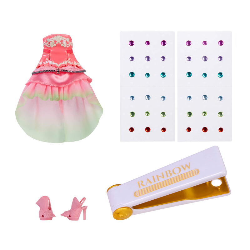 Pink dress with green hem, pink high heels, gems and bedazzling tool on a white background