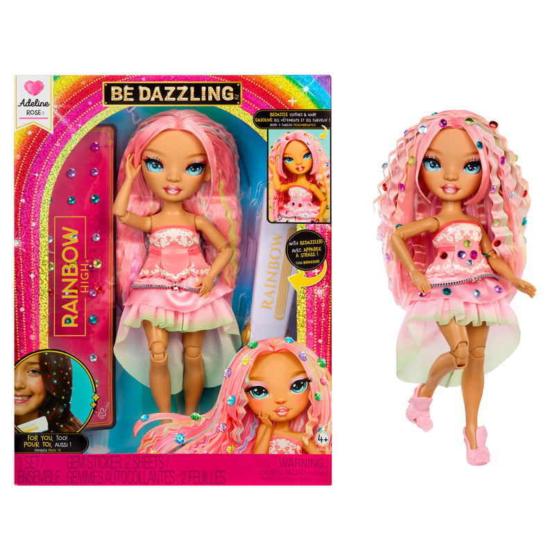 Toy doll with pink hair and dress next to its packaging