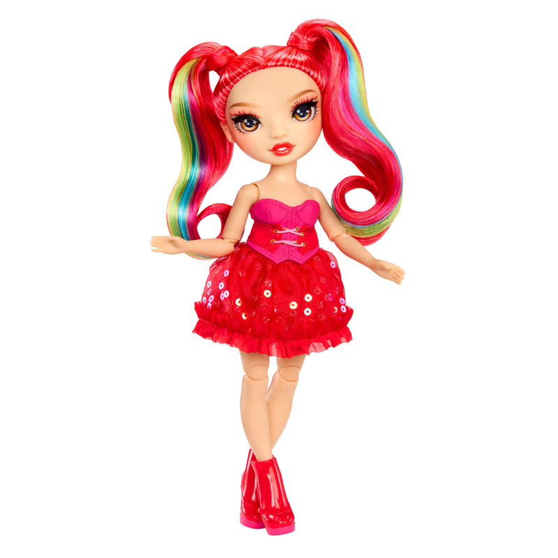 Doll with red hair and colorful streaks styled in pigtails, wearing a red dress with sequins and red shoes on a white background.